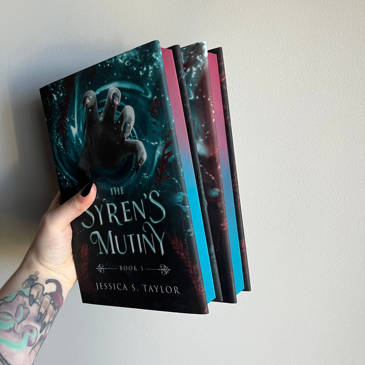 Damaged Sprayed Edge Seas of Caladhan Hardback Set